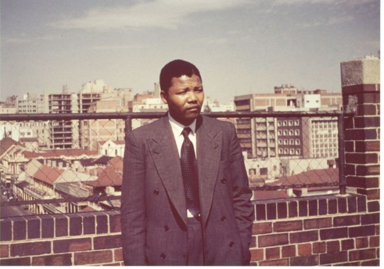 Culled from nelsonmandela.org: Nelson Mandela on the roof of Kholvad House in 1953. Image courtesy of the Ahmed Kathrada Foundation